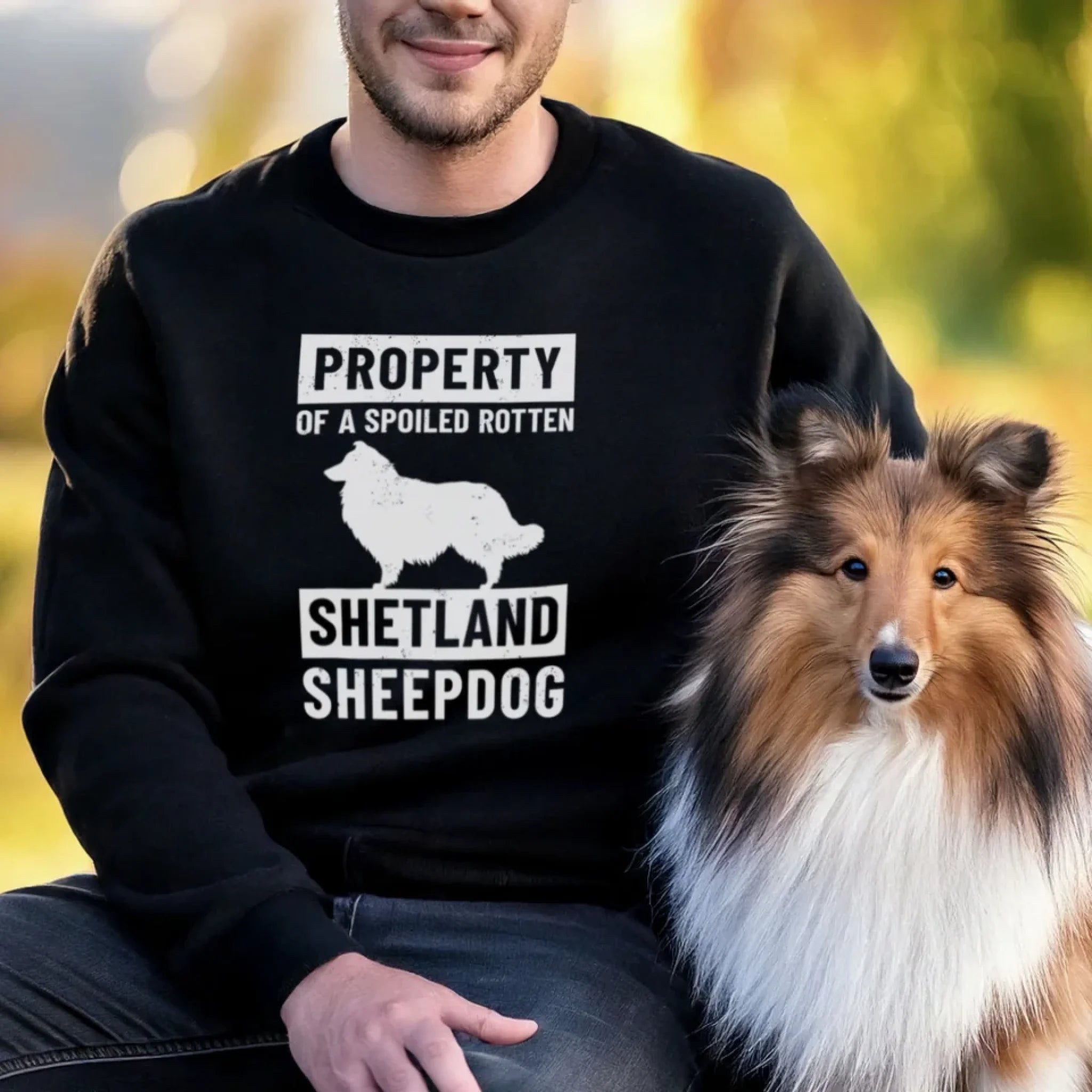 Man-Wearing-a-Sweatshirt-Next-to-Shetland-Sheepdog_Property-of-a-Dog
